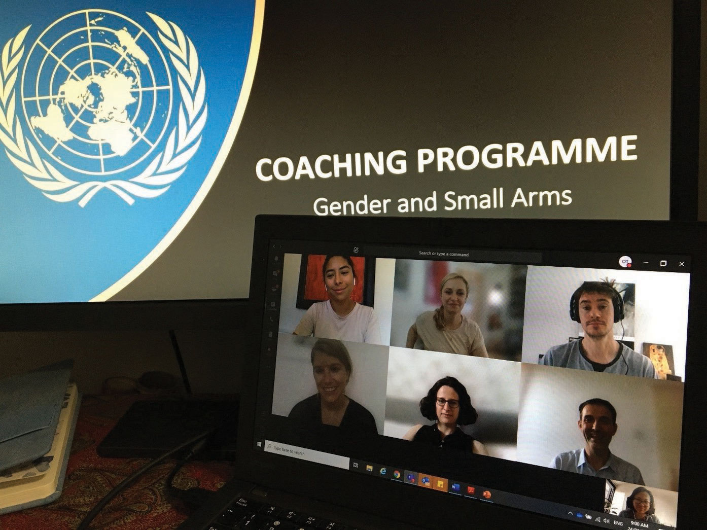 Participants of the coaching programme shown on-screen.